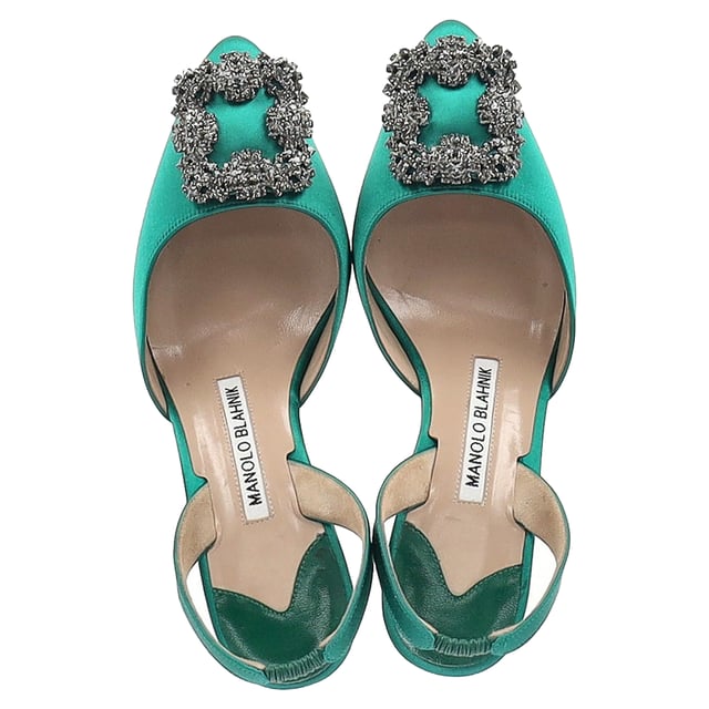 VINTAGE, RRP AS NEW
 Add a touch of luxury and glamour to your footwear collection with the Manolo Blahnik Hangisi 70 Embellished Slingback Pumps in Green Satin. These exquisite pumps are crafted from rich green satin that exudes opulence, while the sleek 70mm heel offers a perfect balance of height and comfort. The standout feature is the intricate embellishment at the toe, adding a dose of sparkle and sophistication to every step you take.

Manolo Blahnik Hangisi 70 Embellished Slingback Pumps in Green Satin

Condition: Very good
Signs of wear: Include Box., Minor markings, Lightly used but very well maintained. Minor mark at soles & creasing, light scuffing at the soles and heels.
Packaging: Box, Dust bag
Color: Green 
Material: Satin 
Size: IT34.5/UK1.5/FR35.5/US4.5/EU34.5
Measurements: Heel height: 80; Insole length: 260
SKU: NAPPUGBSH429005W
