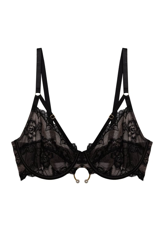 Daring and bold, the Megan BartonHanson x Wolf &Whistle collection is the ultimate shewolf vibe. The Jack Black Lace Plunge Bra features sheer black lace cups with a sexy adjustable harness detail and a gold ring detail in the centre with pearls. The cups are underwired for extra support and the straps are adjustable to ensure the perfect fit. Match with the Jack Suspender and the choice of Crotchless Thong or Thong for the full sexy set.




Black lace Bra
Underwired
Harness detail
Adjustable straps
Gold ring detail