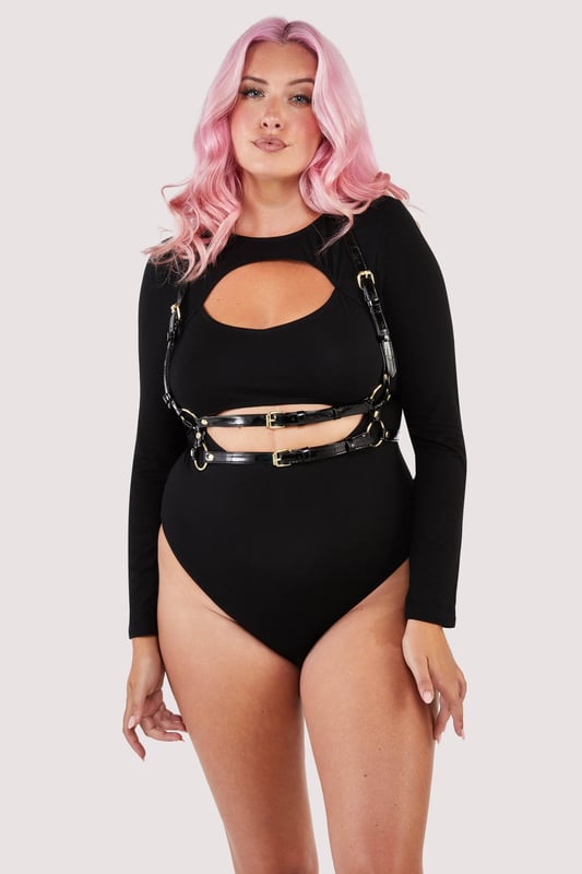 Introducing our Wolf &Whistle Laurel Black CutOut Jersey LongSleeved Body it's the sassy secret weapon your wardrobe's been craving! With its daring cutouts and comfy jersey fabric, this body is ready to unleash your inner mischiefmaker while keeping you looking fab.




Cut out open front detail
Popper fastening gusset
Long sleeves
Full back
Brief style bottom
High rise legs 
Pull on