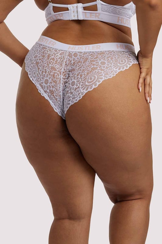 Feel heavenly in our White Hustler branded Lace Brief. Made of flirty floral lace and finished with an elasticated banded waist with Hustler branding to give it a preppy look! Pair it with the matching Lace Bra for the full finish.
 
 Lace Brief
 Elasticated Hustler Banded Waist
 
 Product Info
 Lace: 90% Nylon 10% Elastane Gusset Liner: 100% Cotton Excluding Trims.
 Treat me nice. Do not tumble dry. Hand wash only.