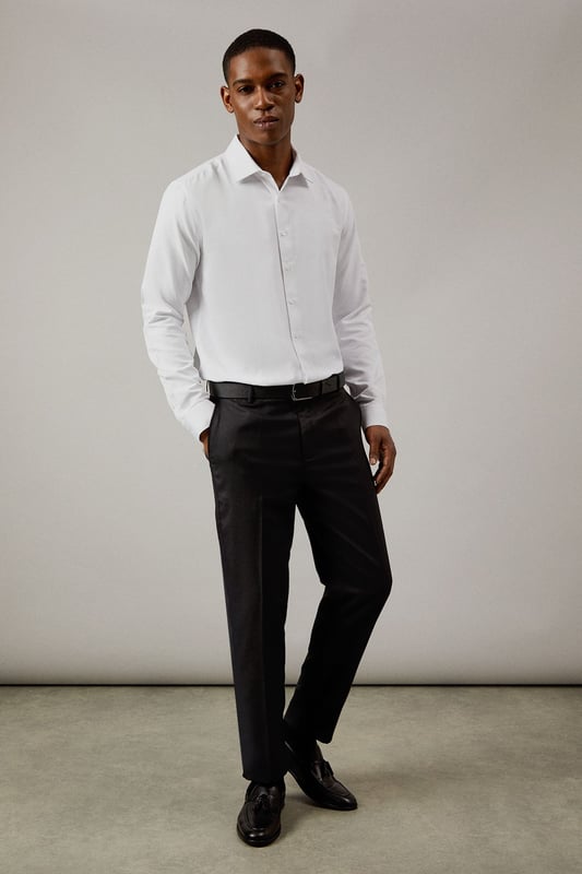 Slim fit design with a modern, tailored silhouette
        Textured fabric with added stretch for comfort and movement
        Clean front crease for a sharp, professional appearance
        Side pockets for practicality without compromising style
        Belt loops for versatile styling options
    
    These textured stretch trousers from Burton offer the perfect balance of comfort and sophistication. The slim fit design creates a contemporary silhouette that flatters without feeling restrictive, whilst the added stretch element ensures ease of movement throughout your day. Pair with a crisp white shirt and polished leather shoes for important meetings or client presentations. For smart casual occasions, try with a lightweight knit and Chelsea boots. The versatile charcoal tone makes these trousers an essential wardrobe staple that transitions seamlessly from office to evening drinks. Ideal for the man who values classic style with modern functionality - these trousers will quickly become your go-to for any occasion where you need to look the part without sacrificing comfort.