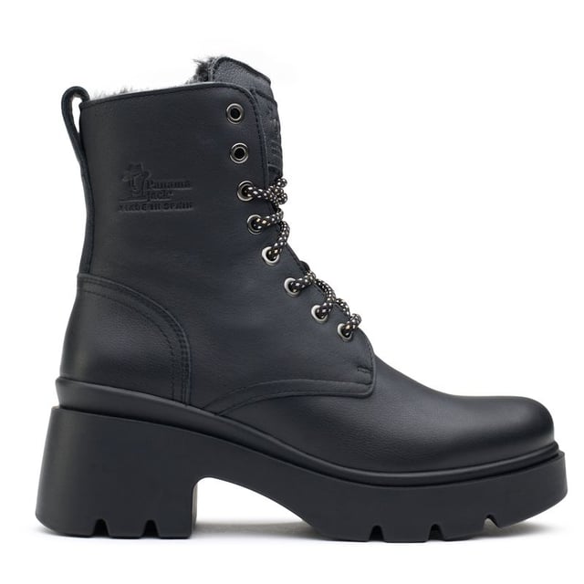 Embrace the seasonal changes in style and confidence with the Panama Jack Porty ankle boots. These black Leather boots blend premium materials with a cleated, rugged rubber sole to provide a gripping, sturdy stride, whilst the block heel and raised sole give extra height. The cosy, cuddly faux fur plush lining keeps your feet warm on chilly days. Their contemporary combat design showcases two-toned laces with gleaming metal eyelets and heel branding. These Panama Jack boots are your quintessential companion for a stand-out, confident look.