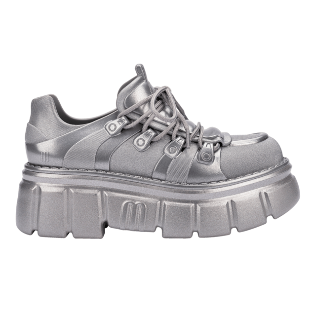 Who knew being a rebel could make one so effortlessly cool? The Melissa Rebel Boot delivers comfort and style with its chunky, treaded sole, laces, and unique design. The combat boot silhouette has been a Melissa bestseller, and this newcomer leaves nothing to be desired