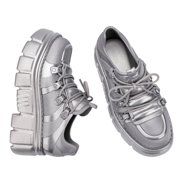 Who knew being a rebel could make one so effortlessly cool? The Melissa Rebel Boot delivers comfort and style with its chunky, treaded sole, laces, and unique design. The combat boot silhouette has been a Melissa bestseller, and this newcomer leaves nothing to be desired