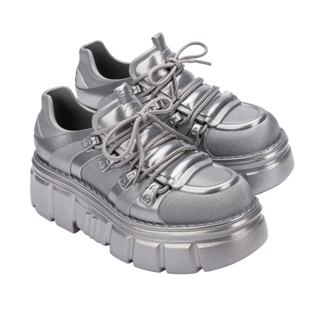 Who knew being a rebel could make one so effortlessly cool? The Melissa Rebel Boot delivers comfort and style with its chunky, treaded sole, laces, and unique design. The combat boot silhouette has been a Melissa bestseller, and this newcomer leaves nothing to be desired