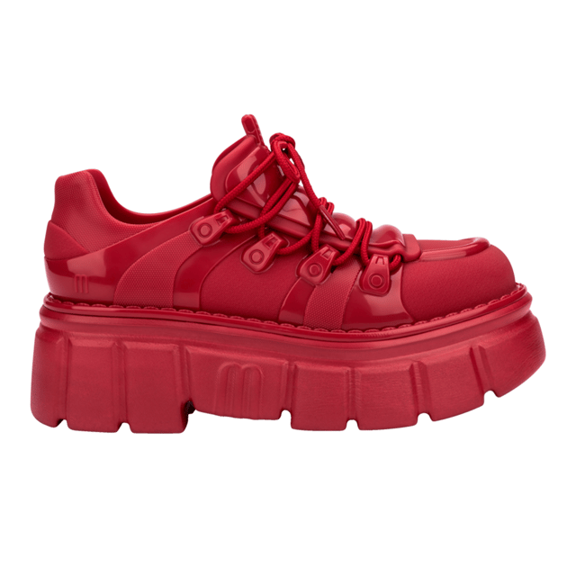 Who knew being a rebel could make one so effortlessly cool? The Melissa Rebel Boot delivers comfort and style with its chunky, treaded sole, laces, and unique design. The combat boot silhouette has been a Melissa bestseller, and this newcomer leaves nothing to be desired