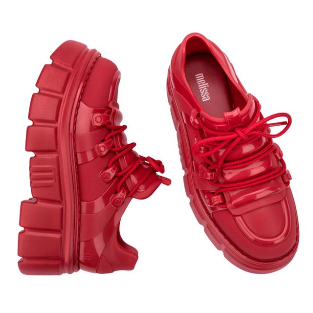 Who knew being a rebel could make one so effortlessly cool? The Melissa Rebel Boot delivers comfort and style with its chunky, treaded sole, laces, and unique design. The combat boot silhouette has been a Melissa bestseller, and this newcomer leaves nothing to be desired