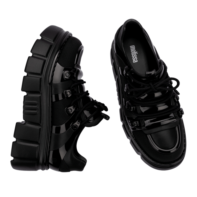 Who knew being a rebel could make one so effortlessly cool? The Melissa Rebel Boot delivers comfort and style with its chunky, treaded sole, laces, and unique design. The combat boot silhouette has been a Melissa bestseller, and this newcomer leaves nothing to be desired