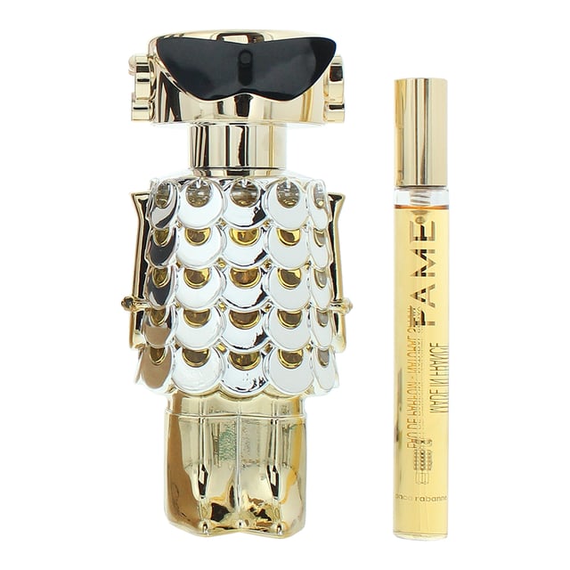 Paco Rabanne Fame 2 Piece Gift Set features Fame Eau de Parfum (80ml & 10ml), a Floral Woody Musk fragrance for women. Launched in 2022, this fragrance is ideal for the warmer seasons and is best suited for day wear. Housed in a classic bottle, it exudes modern femininity with a bold and radiant character.  The fragrance opens with a vibrant fusion of mango and bergamot, delivering a fruity and citrusy freshness. At its heart, the floral elegance of jasmine blends with the resinous depth of olibanum, creating a captivating and sensual aura. The base unfolds into a warm and creamy combination of vanilla and sandalwood, leaving a smooth and long-lasting impression.  Ideal for those who love playful yet sophisticated fragrances, Fame is a radiant and empowering scent that adds a touch of glamour to everyday moments.  
Top Notes: Mango, Bergamot. Middle Notes: Jasmine, Olibanum. Base Notes: Vanilla, Sandalwood.  
How to Apply: 
Apply it to your body's warmest points, such as the crease of your elbows and wrists, to intensify the longevity of the fragrance. Avoid rubbing after application, as this will reduce the longevity of the fragrance. For wrist application, apply the fragrance after hand washing.