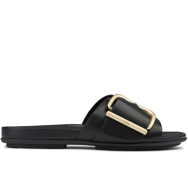 Stap in luxueus comfort met de Fitflop Gracie Maxi Buckle sandalen! Deze chique slippers hebben een strak zwart leren bovenwerk en verfijnde tonale branding. Je zult dol zijn op de naadloze ingebouwde boogcontour en de weelderige leren voering die je voeten zalig ondersteunt. De innovatieve Microwobbleboard-tussenzool zorgt voor schokabsorptie, terwijl de antislip rubberen buitenzool zorgt voor zelfverzekerde stappen. Perfect voor zowel stijl als comfort, de Fitflop Gracie Maxi Buckle is echt een must-have aanvulling op je zomerse garderobe!
