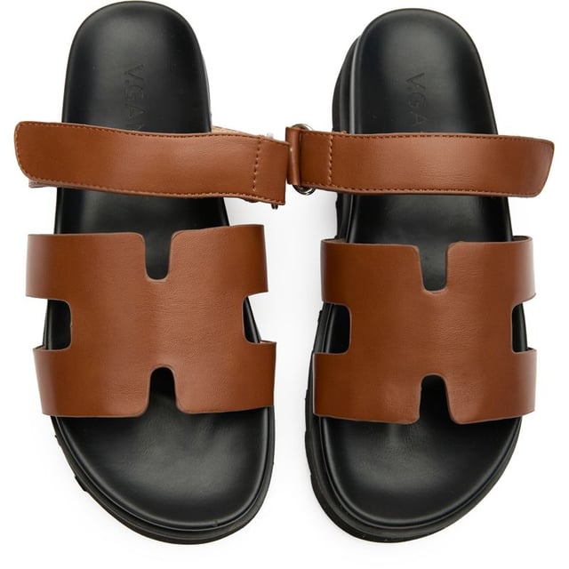 The Shea Slide from V.Gan is the ultimate summer companion.  These fashion-forward, super comfy V.Gans are crafted from high-quality PETA-approved vegan uppers and soles, have a slightly raised platform, offering sleek style and ethical chic. Made in a certified vegan factory using sustainably sourced materials and shipped in recycled packaging, this warm-weather staple will take you on holidays as well as urban alfresco outings and staycation adventures.