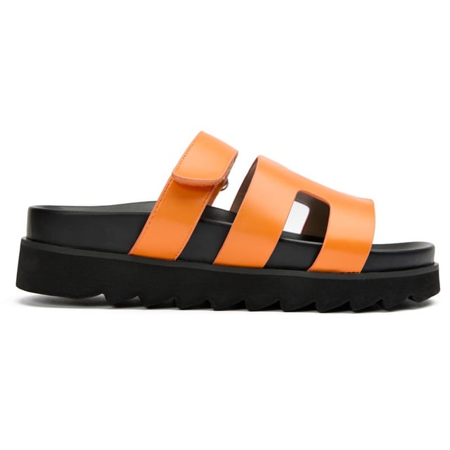 The Shea Slide from V.Gan is the ultimate summer companion.  These fashion-forward, super comfy V.Gans are crafted from high-quality PETA-approved vegan uppers and soles, have a slightly raised platform, offering sleek style and ethical chic. Made in a certified vegan factory using sustainably sourced materials and shipped in recycled packaging, this warm-weather staple will take you on holidays as well as urban alfresco outings and staycation adventures.