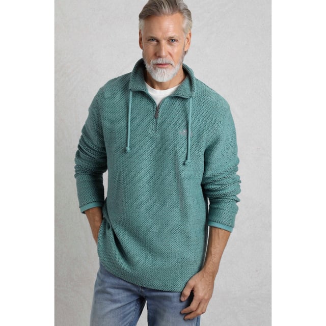 86% Organic Cotton, 14% Recycled Polyester. Fabric: Macaroni. Design: Embroidered, Logo. Branded Zip Pull. Sleeve-Type: Long-Sleeved. Neckline: Standing Collar. Fastening: 1/4, Metal Zip, Tie Neck. Sustainability: Eco Friendly. S: 37 in. M: 40 in. L: 43 in. XL: 46 in. XXL: 49 in. 3XL: 52 in. 4XL: 55 in. 5XL: 58 in.