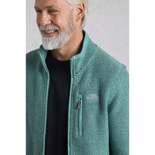 86% Organic Cotton, 14% Recycled Polyester. Fabric: Macaroni. Design: Logo. Hanging Loop. Neckline: High-Neck, Waffle Lined. Sleeve-Type: Long-Sleeved. Pockets: 2 Side Pockets, 1 Chest Pocket, Zip, Waffle Lined. Fastening: Full Zip. Sustainability: Eco Friendly, Made from Recycled Materials. S: 37 in. M: 40 in. L: 43 in. XL: 46 in. XXL: 49 in. 3XL: 52 in. 4XL: 55 in. 5XL: 58 in.