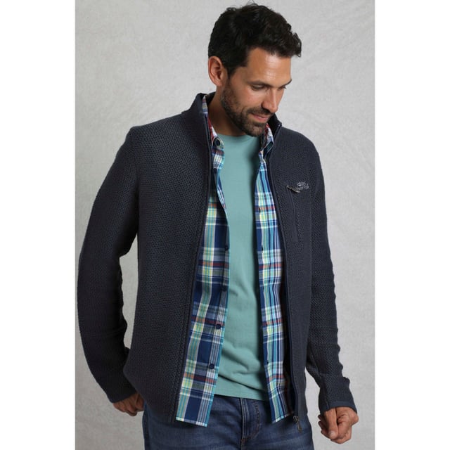 86% organisch katoen, 14% gerecycled polyester. Stof: Macaroni. Ontwerp: Logo. Hangende lus. Halslijn: Hoge Hals, Wafel gevoerd. Mouwtype: Met lange mouwen. Zakken: 2 Zijzakken, 1 Borstzak, Ritssluiting, Wafelvoering. Bevestiging: Volledige ritssluiting. Duurzaamheid: Milieuvriendelijk, gemaakt van gerecycleerde materialen. S: 37 in. M: 40 in. L: 43 in. XL: 46 in. XXL: 49 in. 3XL: 52 in. 4XL: 55 in. 5XL: 58 in.