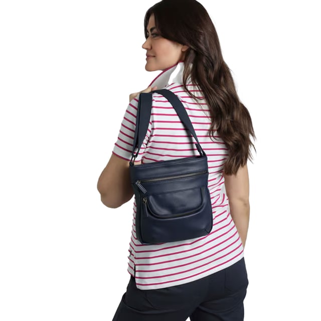 100% Polyurethane. Height: 23cm. Width: 22cm. Depth: 6cm. Pockets: 2 Front Pockets, Zip, Internal. Compartments: 1 Front Compartment, Zipped. Adjustable Shoulder Strap. Design: Embossed, Leather Effect, Logo.