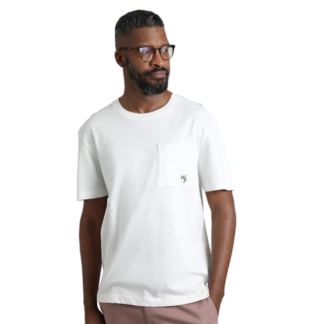 100% Organic Cotton. Fabric: Soft Touch. Design: Logo. Pockets: 1 Chest Pocket. Neckline: Crew Neck, Ribbed. Sleeve-Type: Short-Sleeved. Hem: Side Vents. Fit: Relaxed Fit. S: 37 in. M: 40 in. L: 43 in. XL: 46 in. XXL: 49 in. 3XL: 52 in. 4XL: 55 in. 5XL: 58 in.