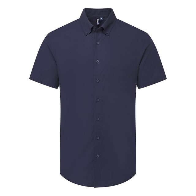 72% Mercerised Cotton, 25% Organic Cotton, 3% Elastane. Fabric: Stretch. Design: Plain. Fastening: Button. Hem: Curved. Cuff: Double Button. Sleeve-Type: Long-Sleeved. Neckline: Turn Down Collar. 2 Back Pleats, Back Darts, Back Yoke, Pearlised Buttons, Self-Coloured Buttons, Shape Retention. 135gsm. Sustainability: Amfori, BSCI, Oeko-Tex Standard 100 Certified, Sedex, WRAP Certified.