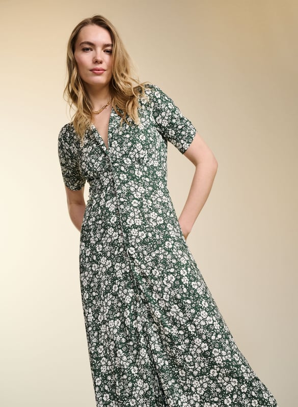 Description\nFits true to size, we suggest ordering your usual size.\nUnapologetically feminine, Sabine is our take on a French-style tea dress. This pretty midi in responsibly sourced jersey features gathering under the bust and is cut to skim the waist before flowing out. Its ditsy floral print and waist ties add to its vintage-inspired appeal. Reach for your basket bag and ballet pumps tout de suite! \n\nMade in Europe\nCrafted in LENZING™ ECOVERO™ jersey\nButtons through \nSewn-in back ties \n\n\nSustainable Attributes:\n\n\n Low Impact \n\n Low Water Use\n\n Ethically made \n \n Low Carbon \n \n\n\nDetails\n Model is 5'10 (177cm) and is wearing a UK 10\n95% LENZING™ ECOVERO™ Viscose, 5% Elastane\nDelicate Machine Wash - 30°\nProduct code: DR40578-FRD\nBack shoulder at neck to hem - 122cm (48)\nSleeve length - 24cm (9 1/2)