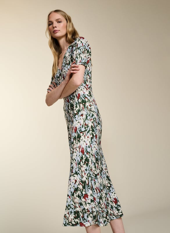 Description\nFits true to size, we suggest ordering your usual size.\nWith Kaydence, occasionwear is made easy. This chic midi will see you through weddings and christenings in unique style thanks to the unexpected pairing of a purple floral print on a bold red base. And then there’s the cut: wafty and A-line and slim through the waist with an under-the-bust seam. Prepare to turn heads!\n\nMade in Europe\nCrafted in LENZING™ ECOVERO™ crepe\nFastens with an invisible centre-back zip\nMidi length\nV-shape neckline\n\n\nSustainable Attributes:\n  Low Water Use  Ethically made  Vegan   \nDetails\nModel is 5'10 (177cm) and is wearing a UK 10100% LENZING™ ECOVERO™ ViscoseDelicate Machine Wash - 30°Product code: DR40614-RANBack shoulder at neck to hem - 124cm (48 7/8)Sleeve length - 27cm (10 5/8)