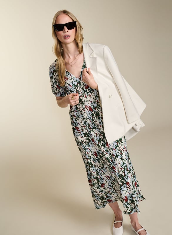 Description\nFits true to size, we suggest ordering your usual size.\nWith Kaydence, occasionwear is made easy. This chic midi will see you through weddings and christenings in unique style thanks to the unexpected pairing of a purple floral print on a bold red base. And then there’s the cut: wafty and A-line and slim through the waist with an under-the-bust seam. Prepare to turn heads!\n\nMade in Europe\nCrafted in LENZING™ ECOVERO™ crepe\nFastens with an invisible centre-back zip\nMidi length\nV-shape neckline\n\n\nSustainable Attributes:\n  Low Water Use  Ethically made  Vegan   \nDetails\nModel is 5'10 (177cm) and is wearing a UK 10100% LENZING™ ECOVERO™ ViscoseDelicate Machine Wash - 30°Product code: DR40614-RANBack shoulder at neck to hem - 124cm (48 7/8)Sleeve length - 27cm (10 5/8)
