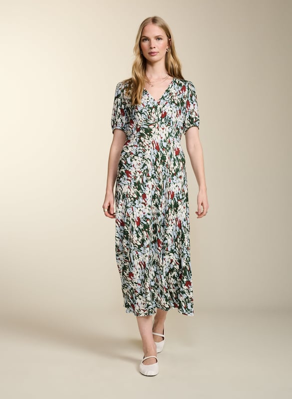 Description\nFits true to size, we suggest ordering your usual size.\nWith Kaydence, occasionwear is made easy. This chic midi will see you through weddings and christenings in unique style thanks to the unexpected pairing of a purple floral print on a bold red base. And then there’s the cut: wafty and A-line and slim through the waist with an under-the-bust seam. Prepare to turn heads!\n\nMade in Europe\nCrafted in LENZING™ ECOVERO™ crepe\nFastens with an invisible centre-back zip\nMidi length\nV-shape neckline\n\n\nSustainable Attributes:\n  Low Water Use  Ethically made  Vegan   \nDetails\nModel is 5'10 (177cm) and is wearing a UK 10100% LENZING™ ECOVERO™ ViscoseDelicate Machine Wash - 30°Product code: DR40614-RANBack shoulder at neck to hem - 124cm (48 7/8)Sleeve length - 27cm (10 5/8)