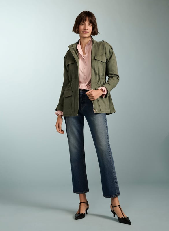 Description\nFits true to size, we suggest ordering your usual size.\nSima is a frill-adorned take on our best-selling Imken blouse. This feminine shirt features a relaxed collar with a ruffled trim - a detail that’s echoed in the elasticated cuffs. Cut from planet-conscious jersey for easy, all-day comfort, it’s a hard-working style to see you through work days and weekends.\n\nMade in Europe\nCrafted in LENZING™ ECOVERO™ jersey\nRelaxed fit\nGathered detail around the shoulders\n\n\nSustainable Attributes:\n Low Impact  Low Water Use Ethically made  Vegan   Low Carbon  \n\nDetails\nModel is 5'10 (177cm) and is wearing a UK 1095% LENZING™ ECOVERO™ Viscose, 5% ElastaneDelicate Machine Wash 30˚Product code: JB40007-PPKBack shoulder at neck to hem - 62cm (24 2/5)Sleeve length - 62cm (24 2/5)