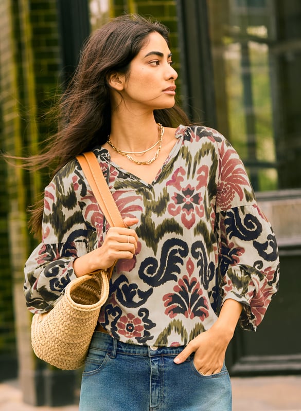 Description\nFits true to size, we suggest ordering your usual size.\nCall on a printed blouse to add some oomph to your trusted summer staples. MaryJayne features an exotic, mood-lifting print, and comes in an unstructured, peasant-inspired shape. Cut for a relaxed fit with voluminous sleeves, wear it half-unbuttoned and tucked into a pair of denim shorts.\n\nMade in Europe\nCrafted in LENZING™ ECOVERO™ viscose voile\nCasual fit\nButtons through with rouleau loop fastenings\nCoordinating neck ties\nButton on cuffs\n\n\nSustainable Attributes:\n  Low Water Use  Ethically made  Vegan  \n\nDetails\nModel is 5'10 (177cm) and is wearing a UK 10100% LENZING™ ECOVERO™ ViscoseDelicate Machine Wash - 30°Product code: SH40240-CPMBack shoulder at neck to hem - 63cm (24 7/8)Sleeve length - 71cm (28)