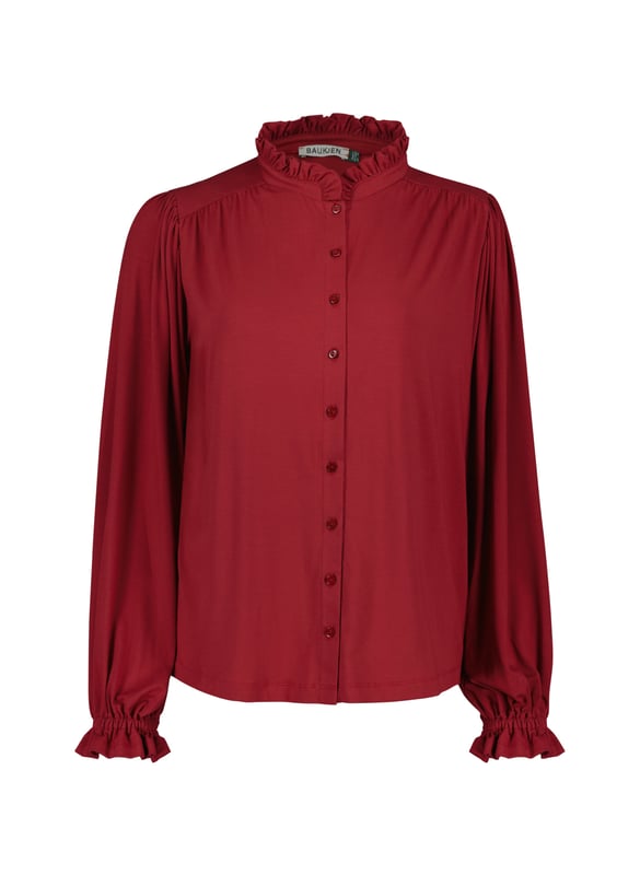Description\nFits true to size, however if you are inbetween sizes, we suggest you size down.\nSima is a frill-adorned take on our best-selling Imken blouse. This feminine shirt features a relaxed collar with a ruffled trim - a detail that’s echoed in the elasticated cuffs. Cut from planet-conscious jersey for easy, all-day comfort, it’s a hard-working style to see you through work days and weekends.\nLove Sima for wearing solo or under knits - Baukjen\n\nMade in Europe\nCrafted in LENZING™ ECOVERO™ jersey\nRelaxed fit\nGathered detail around the shoulders\n\n\nSustainable Attributes:\n\n  \n Low Impact \n\n Low Water Use \n  \n Natural fibres \n   Ethically made\n\n Low Carbon \n\nDetails\n95% LENZING™ ECOVERO™ Viscose, 5% ElastaneDelicate Machine Wash - 30°Product code: JB40007-PWHBack shoulder at neck to hem - 62cm (24 2/5)Sleeve length - 62cm (24 2/5)