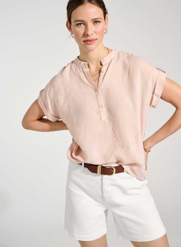 Description\nOn warm days where you’re seeking something a little different from a blouse or tee, reach for Alexia. This effortless style comes in a relaxed, boxy silhouette and grown-on sleeves. In a pretty shade of powder pink, it works with both tailored navy trousers and crisp white jeans. In breathable linen, it’ll keep you looking - and feeling - cool.  \n\nMade in Europe\nCrafted from pure flax linen \nHalf button fastening \nSimply pulls on \nStand collar\n\n\nSustainable Attributes:\n  Low Water Use   Natural fibres    Ethically made    Vegan \n\nDetails\n100% Linen Delicate Machine Wash - 30°Product code: SH40235-PPKBack shoulder at neck to hem - 60cm (23 5/8)