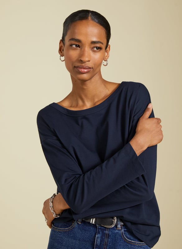 Description\nFits true to size, however if you are inbetween sizes, we suggest you size down.\nMore substantial than a tee yet lighter than a sweatshirt, the Montrose Organic Top is a casual staple! This relaxed style is cut with a wide boat neck and dropped shoulders, creating a cool twist on a long-sleeve layer. It’s crafted from a premium, heavyweight blend of recycled and organic cotton jersey, boosting its eco credentials. Tucked into jeans with a shacket or a blazer thrown over the top, it’s off-duty dressing sorted.\n\nMade in Europe\nCrafted in organic and recycled cotton blend premium jersey\nRelaxed fit\nSimple pulls on\nContemporary classic\n\n\nSustainable Attributes:\n  Low Water Use  Natural fibres   Organic   Recycled Fibres   Ethically made  Low Carbon \n\nDetails\nModel is 5'10 (177cm) and is wearing a UK 1050% Recycled Cotton, 50% Organic CottonDelicate Machine Wash - 0°Product code: TP40790-DPIBack shoulder at neck to hem - 63cm (24 7/8)Sleeve length - 48cm (18 7/8)