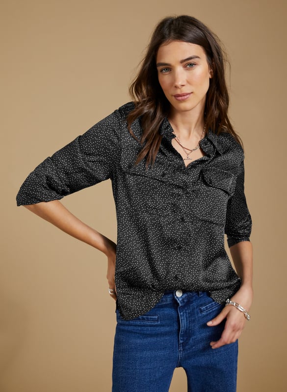 Description\nFits true to size, we suggest ordering your usual size.\nWoven from a premium responsibly sourced viscose that feels like silk, Saffron is a chic sateen shirt to update your wardrobe. Its utility pockets detailing, and subtle spot print make it a contemporary classic. Easy and effortless, style it with the co-ordinating Mandy Satin Trousers for a cool co-ordinating look.\n\nMade in Europe\nCrafted in viscose satin Lenzing™ EcoVero™\nUtility pocket detailing\nButton through\nRelaxed fit\n\n\nSustainable Attributes:\n  Low impact  Low Water Use   Natural fibres   Recycled Fibres   Ethically made  Low Carbon \n\nDetails\nModel is 5'10 (177cm) and is wearing a UK 1049% Lenzing™ EcoVero™ Viscose, 51% Recycled ViscoseDelicate Machine Wash 30˚Product Code: SH40284-BNSBack shoulder at neck to hem - 65cm (25 5/8)Sleeve length - 60cm (23 5/8)