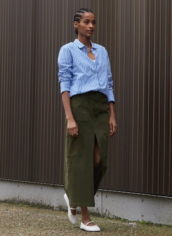 Description\nFits true to size, we suggest ordering your usual size.\nA crisp shirt is so versatile, there’s no such thing as having too many! We’ve created Rishma in organic cotton and classic, light blue and white stripes. With a borrowed-from-the-boys fit, it looks chic half-tucked into any style of trouser, dark and white jeans included.\n\nMade in Europe\nCrafted in organic, yarn-dyed cotton shirting\nSlightly oversized fit\nDeep cuffs\n\n\nSustainable Attributes:\n  Natural fibres    Organic   Ethically made  Vegan \n\nDetails\nModel is 5'10 (177cm) and is wearing a UK 10100% Organic Cotton Delicate Machine Wash - 40°Product code: SH40259-BSWBack shoulder at neck to hem - 73cm (28 3/4)Sleeve length - 60cm (23 5/8)