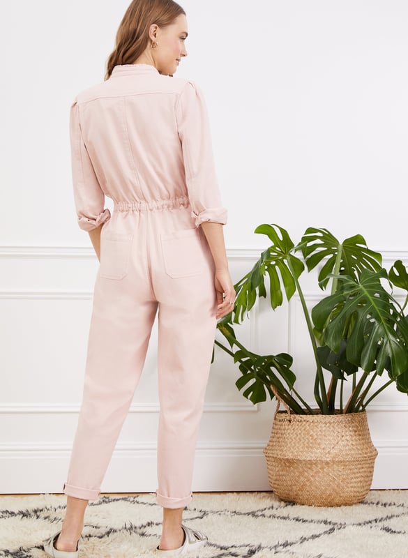 Description\nSally is quite literally a one-piece wonder! A feminine take on a boiler suit, we’ve added a ruffled stand collar and gathering into the shoulders, and for a flattering fit, a tapered leg shape and an elasticated waist. There are so many ways to style it: worn open with a tank and hi-tops, or fully fastened with big hoops and heels. Either way, expect to wear it on repeat.\nI love this. Easy one-piece style Baukjen\n\nCrafted in premium organic cotton\nZip fastening - simply pulls on\nPatch pockets on the chest and hips\nCan be styled with a belt\n\n\nSustainable Attributes:\n Made in Europe Ethically made  Vegan   Natural fibres   Organic \n\nDetails\n97% Organic Cotton, 3% ElastaneMachine Wash - 30°Product code: JS40045-PPKInside leg - 73cm (28 3/4)Sleeve length - 60.5cm (23 7/8)