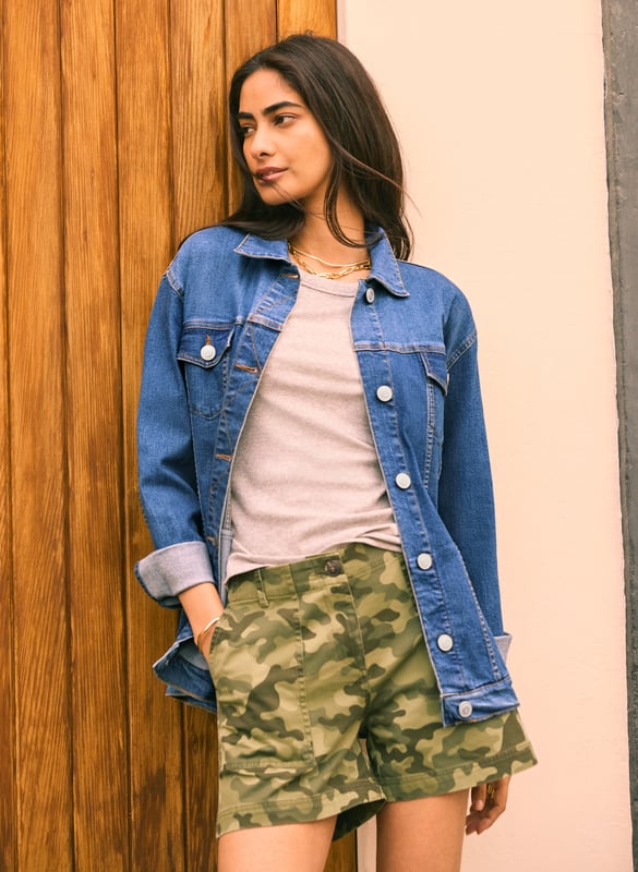 Description\nWe’ve updated the classic indigo jean jacket to offer a longer, rear-skimming silhouette. This shape works well over printed dresses as well as offering coverage over leggings or jeans. Crafted from soft organic cotton, we've added just the right amount of stretch to make sure it offers everyday comfort. With contrast stitching and the perfect mid-blend wash, prepare to wear this wardrobe classic on repeat. \n“I’ll be wearing this over most of my looks”, Baukjen  \n\nMade in Europe\nCrafted in organic stretch cotton \nWardrobe classic \nLonger line \n\n\nSustainable Attributes:\n\n \n Natural fibres \n \n Organic \n \n Ethically made \n\n Vegan \n \n Low Carbon \n\nDetails\n Model is 5'10 (177cm) and is wearing a UK 10\n99% Organic Cotton, 1% Elastane\nDelicate Machine Wash - 40°\nProduct code: JK40120-WSD \nBack shoulder at neck to hem - 70cm (27 1/2)\nSleeve length - 55cm (21 5/8)