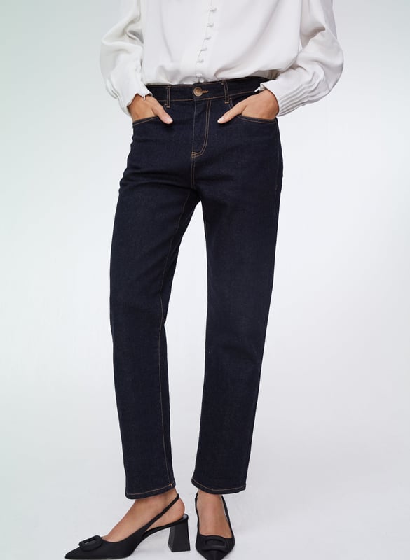 Description\nFits true to size, we suggest ordering your usual size.\nWe’ve tweaked our much-loved organic cotton Boyfriend Jean to incorporate recycled elastane. A small amount is needed for a comfy stretch - but it's a synthetic fibre - so after years of searching, we’re thrilled to have found a lower impact alternative. Expect the same cropped and subtly tapered leg shape with a flattering and feminine fit which has made this style one of our best-sellers. \n“This style formula never dates” - Baukjen\n\nMade in Europe\nCrafted in premium organic denim that holds its shape\nSubtly tapered leg\nEasy fit around the hip and thigh\nAdded stretch for comfort\n\n\nSustainable Attributes:\n Natural fibres  Organic  Ethically made\n Low Carbon    Vegan\n\nDetails\n99% Organic Cotton, 1% ElastaneMachine Wash - 30°Wash Inside Out - Wash Dark Colours SeparatelyProduct Code: TR512-DARInside leg (Rolled) - 68cm (26 3/4”) (Unrolled) - 72cm (28 3/8”)