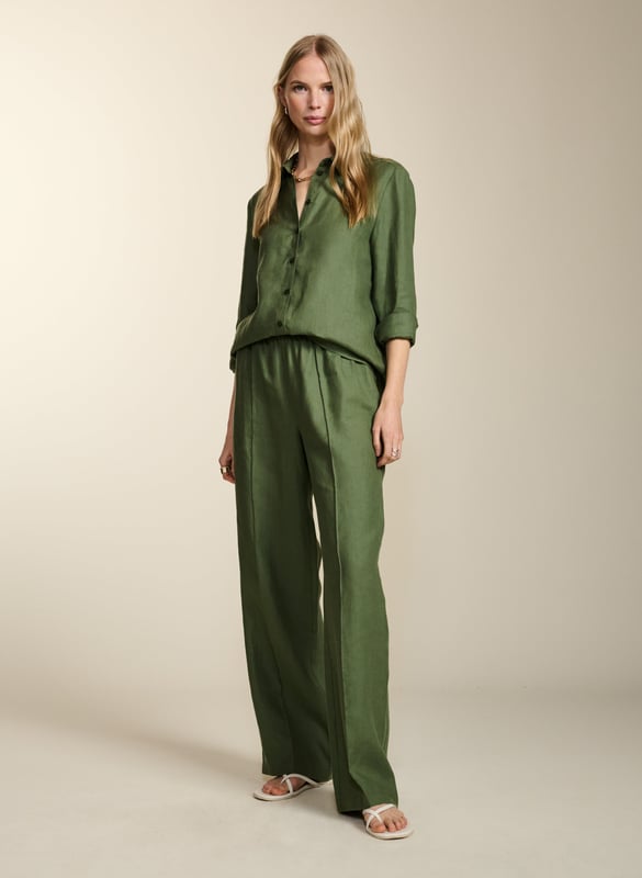 Description\nFits true to size, we suggest ordering your usual size.\nConsider Yvonne as a ‘semi-smart’ trouser - they blend the elegance of wide-leg tailoring with the comfort of an elasticated waistband (really!). This style in lightweight hemp features a pintuck down each leg and a simple, fuss-free front. We’ll be styling them with the matching Della Hemp Shirt for a low-maintenance co-ord.  \n\nMade in Europe \nCrafted in hemp \nPockets in side seams \nSimply pull on  \n\n\nSustainable Attributes:\n\n \n Low Water Use \n \n Natural fibres  \n \n Ethically made  \n \n Vegan  \n \n Low Carbon \n\n\nDetails\n Model is 5'10 (177cm) and is wearing a UK 10100% Hemp \nDelicate Machine Wash - 30°\nProduct code: TR40350-LKH \nInside leg - 80cm (31 1/2)