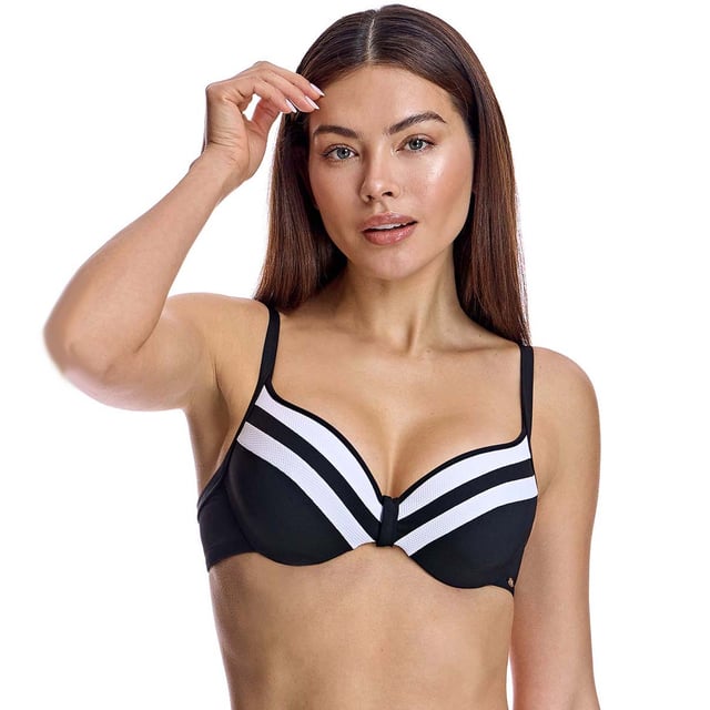 This underwire bikini top is the perfect combination of style and function. It offers a sophisticated and eye-catching look for the beach or pool.\n\n Details:\n\n - Cups with underwire and reinforced support.\n - Adjustable straps.\n - Sport-inspired design.\n - Quick-drying and chlorine-resistant material.\n - Secure rear closure.\n\n There is no doubt that bikinis are one of the most popular swimwear items among women. Among bikinis, the bikini top plays a fundamental role in making you look and feel beautiful. We work on models that make you feel elegant and beautiful at the same time, avoiding any kind of vulgarity.\n\n Our bikini tops adapt perfectly to any type and size of breast without exception.\n Composition: Exterior: 76% Polyamide, 24% Elastane; Interior: 72% Polyamide, 28% Elastane, Cup: 100% Polyester\n Care:\nHand wash.\n Use neutral soap.\n Do not twist or squeeze.\n Air dry.