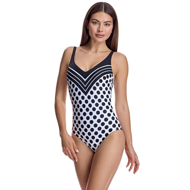 This one-piece swimsuit for women combines elegance and comfort with a slimming design that flatters the silhouette. Its high-quality materials and carefully crafted details make it an ideal women's swimsuit for looking sophisticated on the beach or by the pool.\n\n Details:\n - V-neckline.\n - Adjustable straps.\n - Polka dot print.\n - Removable cups.\n - Low U-shaped back.\n - Quick-drying and chlorine-resistant material.\n - Optimal coverage and support.\n\n We can safely say that women's one-piece swimsuits will offer you everything you are looking for. If you are interested in purchasing a stylish and practical piece that will allow you to swim at any time of the year, women's one-piece swimsuits are for you.\n\n Our one-piece swimsuits for women adapt perfectly to any type and size of breast without exception.\n Composition: Exterior: 80% Polyamide, 20% Lycra; Interior: 80% Polyamide, 20% Elastane; Cup: 100% Polyester\n Care:\nHand wash.\n Use neutral soap.\n Do not twist or squeeze.\n Air dry.