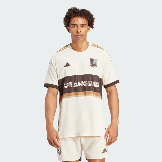 Football fever first took hold in LA in the mid 1970s. Celebrating those boom years, this adidas Los Angeles FC authentic jersey throws out vintage vibes with an era-appropriate colour palette and a bold team name on the chest. Ventilating HEAT.RDY and lightweight details make for unbeatable performances on the pitch. This product is made with 100% recycled materials. By reusing materials that have already been created, adidas help to reduce waste and our reliance on finite resources and reduce the footprint of the products adidas make.  - Slim fit - Crewneck - 100% polyester (recycled) - HEAT.RDY - Mesh side panels - Los Angeles FC raised embroidery crest - Ribbed cuffs - Droptail hem  Shipped by adidas