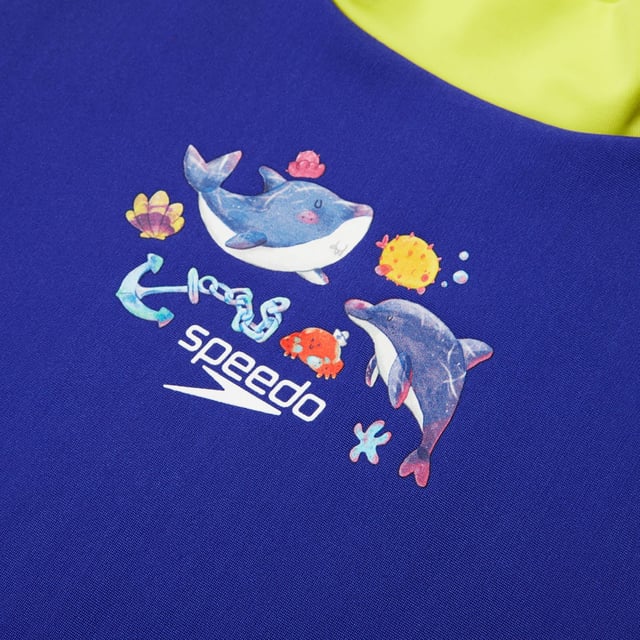Bring the magic of the ocean to life with our Water Explorers range. Featuring bold colours and a nautical\u0002themed sailboat print  this Short Sleeve Rash Top Set appeals to your little one’s sense of fun and includesa matching top and shorts. The pull-on rash top provides coverage for their shoulders  tummy and backand includes UV protective fabric of UPF40+ for sun protection in and out of the water. Designed for alltheir water adventures  our EnduraBrite fabric offers higher chlorine resistance than standard swimwearfabrics  delivers superb colour performance and fits like new for longer with CREORA® HighClo™. Made inpart from recycled plastic bottles - polyester yarns in the Endurabrite fabric are made from 100% pos