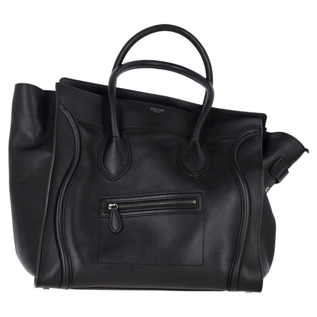 VINTAGE, RRP AS NEW
The Celine Mini Grained Luggage Tote in black leather is a sophisticated statement piece. Crafted from smooth calfskin leather, this bag features iconic rolled leather top handles adorned with signature Celine scroll trim, offering both style and practicality for everyday use or travel.
with Dust bag
Celine Mini Grained Luggage Tote in Black Leather
Condition: very good
Signs of wear: No retail tag, No visible sign of wear., 
Packaging: Dust bag
Color: black
Material: Leather | leather
Size: One Size | One Size
SKU: 458814 / NAPPUGBBA431535W  
Dimensions:  Length: 220 mm, Width: 50 mm, Height: 150 mm
