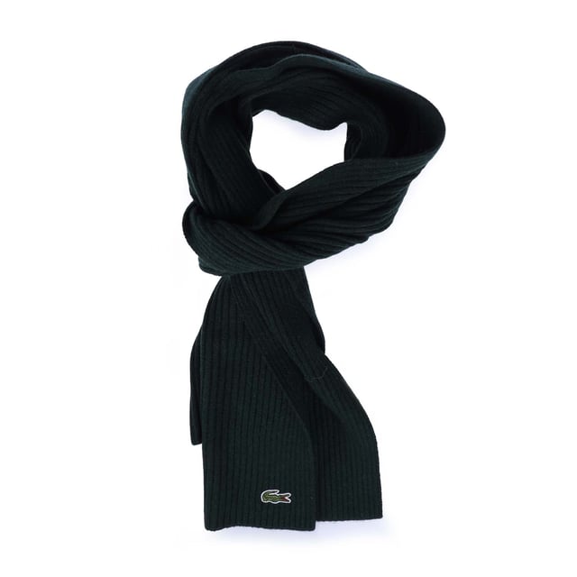 Lacoste Ribbed Rectangular Wool Scarf. Thanks to its classic design and its comforting warmth, this scarf will be your best ally to face the winter cold.- Wool Rib 2*2.- 3cm green crocodile. Material: 100% Wool. Ref: RE2217YZP.