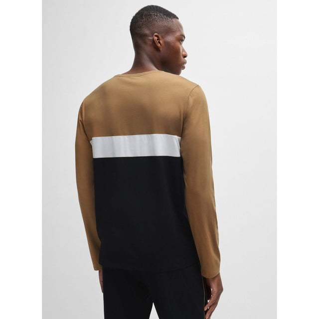Men's Boss Long Sleeved Logo Print Pyjama T-Shirt. Pajama top from the BOSS collection. Model made of cotton knit fabric.- Classic round neckline.- Long sleeves.- Decorative seams.- Logo patch on the front.- Fine, elastic knit.- Heatseal Logo.- Contrast piping and inserts. Material: 55% Cotton, 37% Modal, 8% Elastane. Ref: 50527337001.