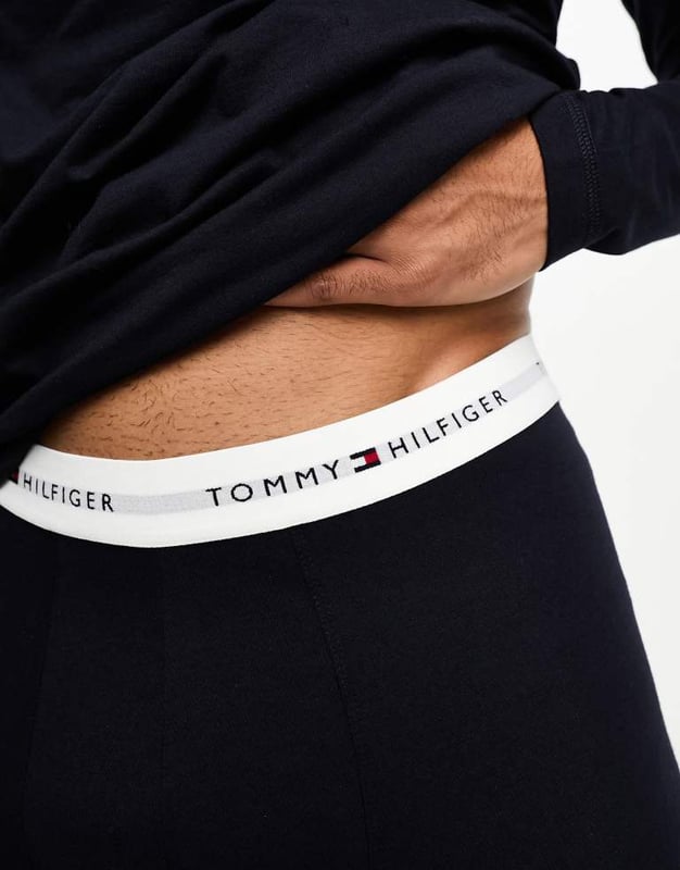 Tommy Hilfiger thermal pants in navy Pyjamas by Tommy Hilfiger Comfort zone: entered Elasticated waist Branded taping Fitted cuffs Slim fitSold By: Asos