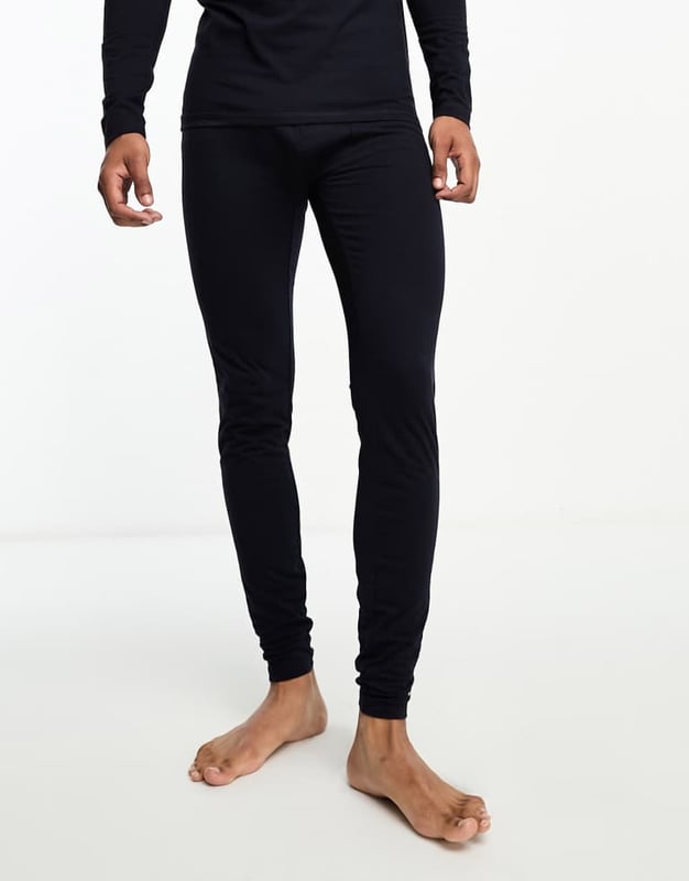 Tommy Hilfiger thermal pants in navy Pyjamas by Tommy Hilfiger Comfort zone: entered Elasticated waist Branded taping Fitted cuffs Slim fitSold By: Asos