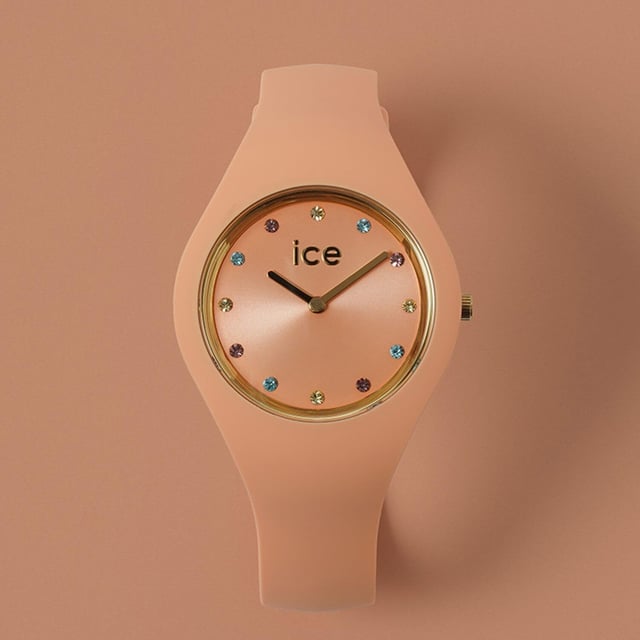 This Ice Watch Ice Cosmos - Apricot Analogue Watch for Women is the perfect timepiece to wear or to gift. It's Orange 37 mm Round case combined with the comfortable Orange Silicone watch band will ensure you enjoy this stunning timepiece without any compromise. Operated by a high quality Quartz movement and water resistant to 10 bars, your watch will keep ticking. This watch with a super soft silicone strap, will add a flash of vibrant style to all your outfits! High quality 19 cm length and 14 mm width Orange Silicone strap with a Buckle Case diameter: 37 mm,case thickness: 8 mm, case colour: Orange and dial colour: Orange