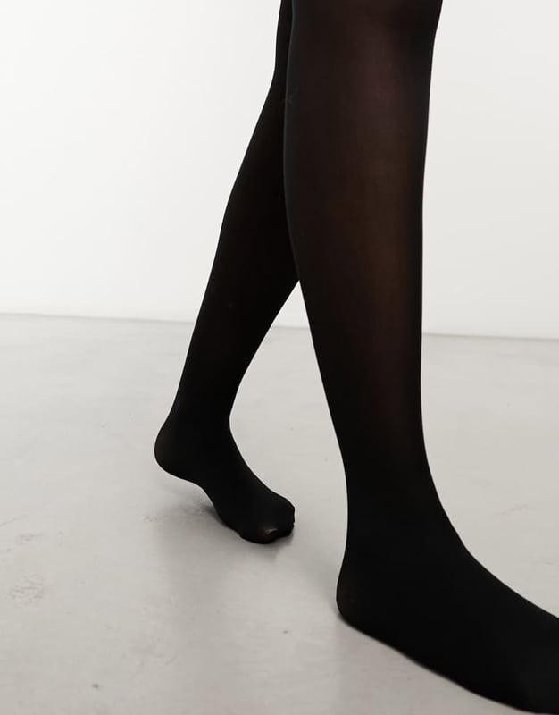Socks & Tights by Pretty Polly Start with the basics Pack of four 60 denier High rise Elasticated waistband Semi-sheer finishSold By: Asos