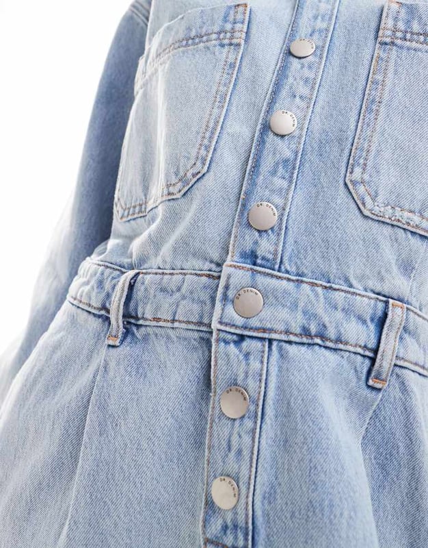 Dresses by Dr Denim There's dressing up, then there's this Spread collar Button placket Long sleeves Chest pockets Relaxed fitSold By: Asos