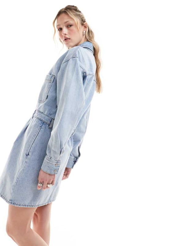 Dresses by Dr Denim There's dressing up, then there's this Spread collar Button placket Long sleeves Chest pockets Relaxed fitSold By: Asos